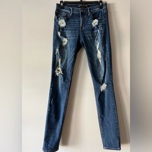 Gently used Express Mid Rise Ripped Jean Leggings size:4